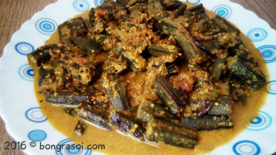 Shorshe Dharosher Jhal Sarso Bhindi Okra With